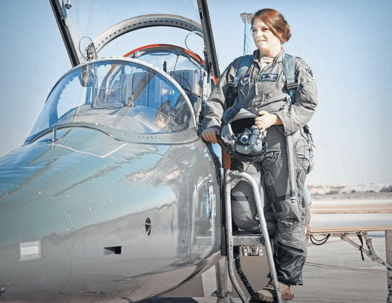 Maj. Vanessa Beaudreault, 12th Flying Training Wing executive officer, steps into the cockpit of a T-38 Talon aircraft Feb. 1 at Joint Base San Antonio-Randolph.